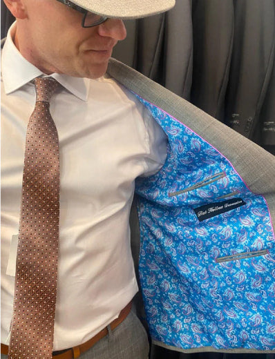A Carmel Tailoring client in a custom suit